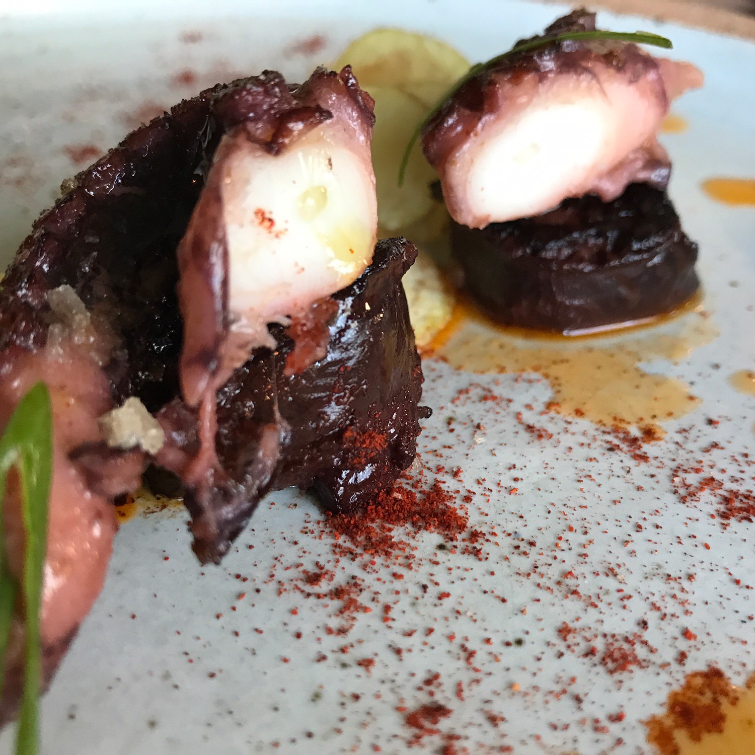 Texas Toast, smoked octopus, beef brisket, beans, homemade root beer