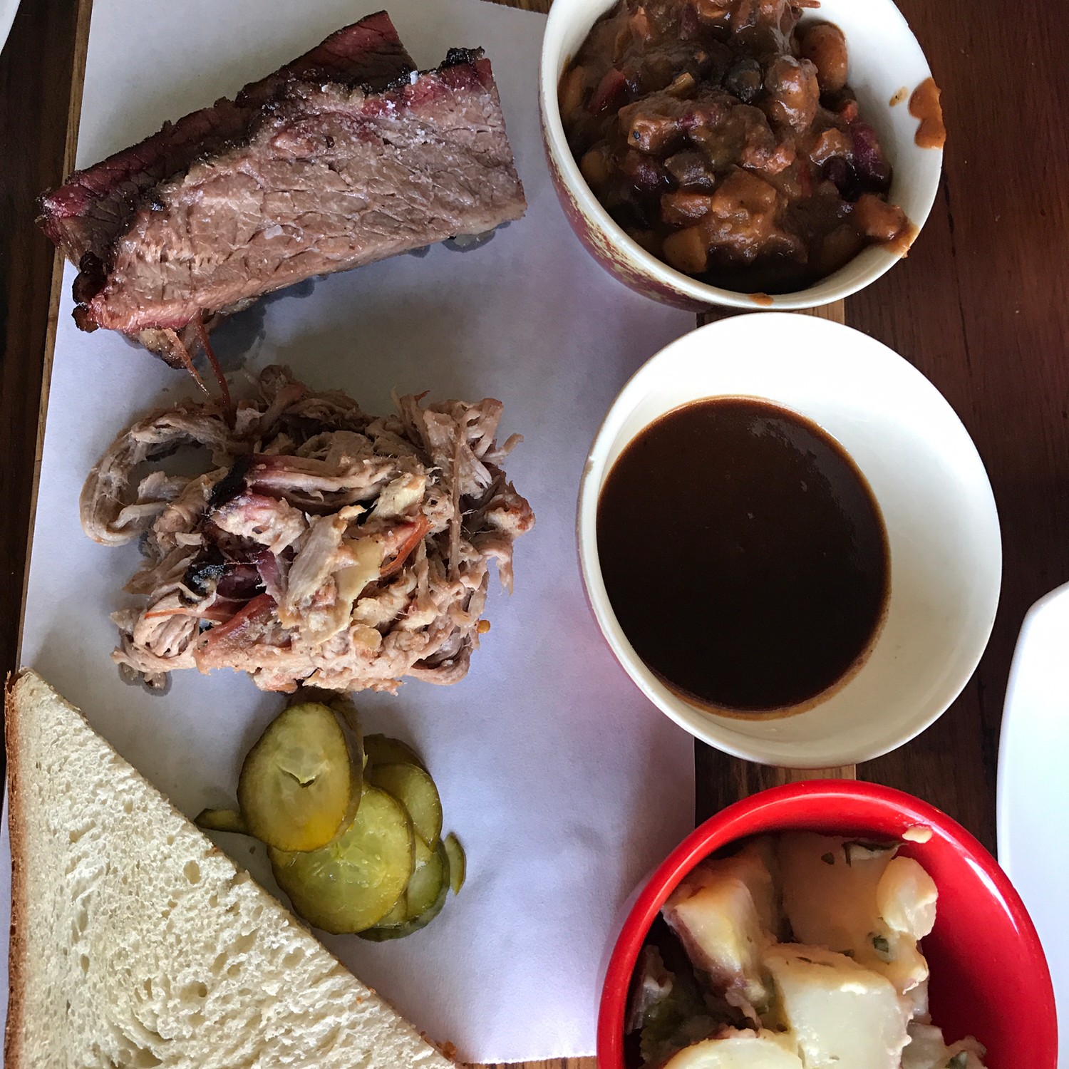 Texas Toast, smoked octopus, beef brisket, beans, homemade root beer