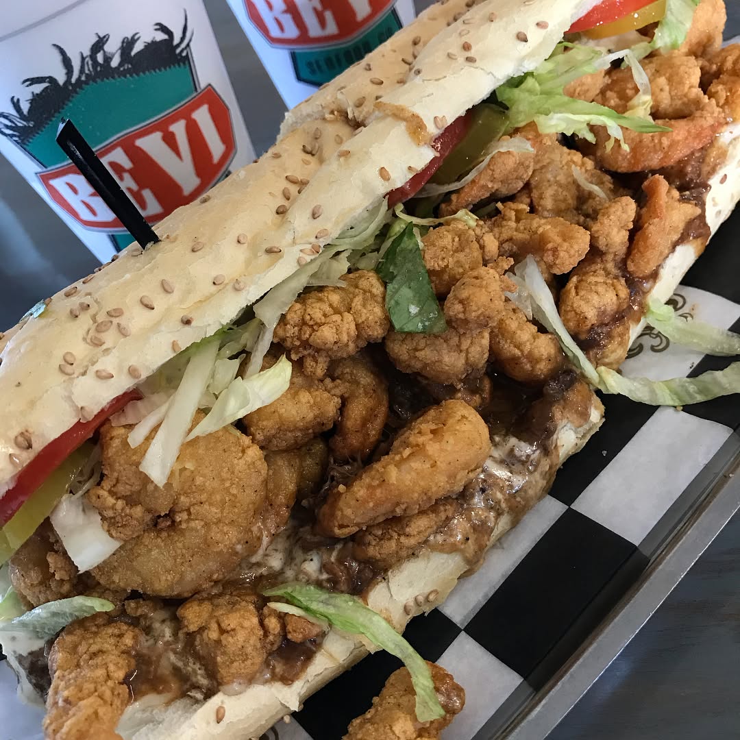 peacemaker - fried shrimp and roast beef Po-Boy sandwich and fried shrimp pla...