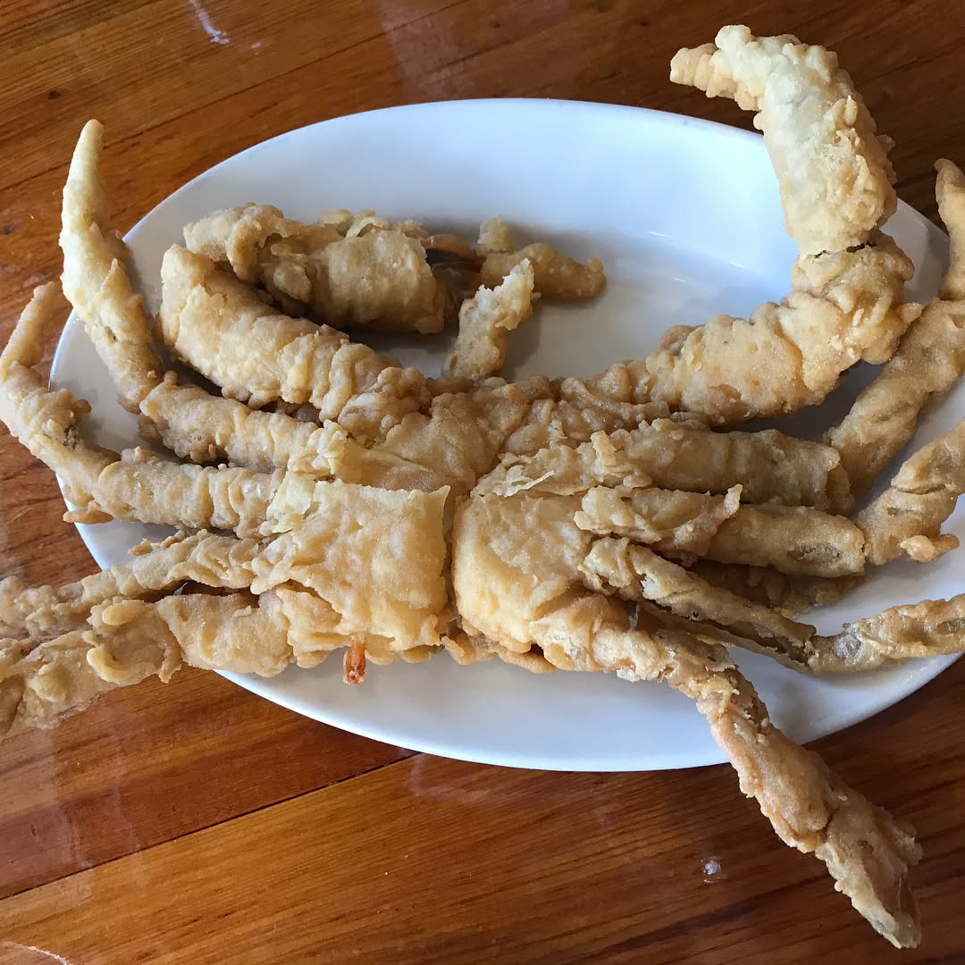 Catfish and seafood at the world famous thin fried catfish, boiled blue crab,...
