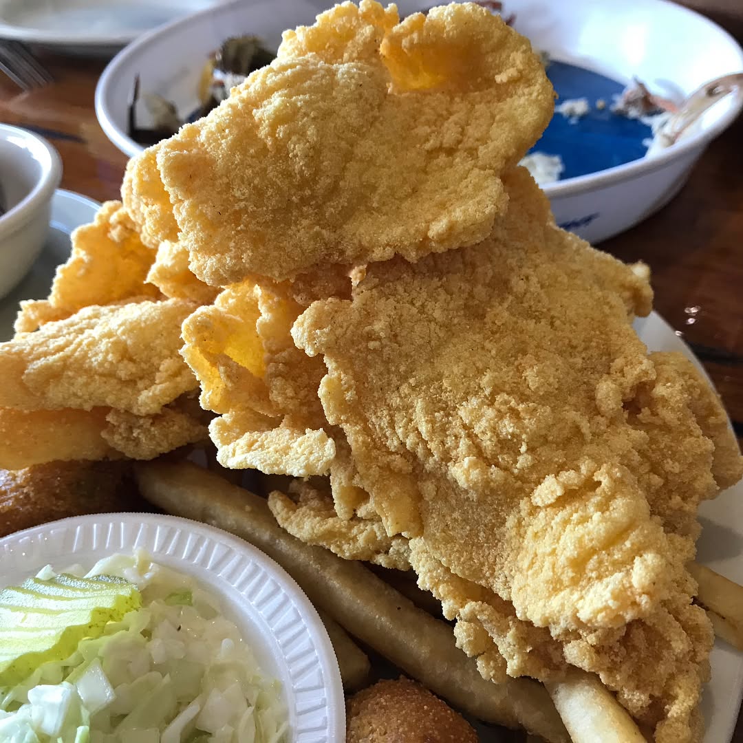 Catfish and seafood at the world famous thin fried catfish, boiled blue crab,...
