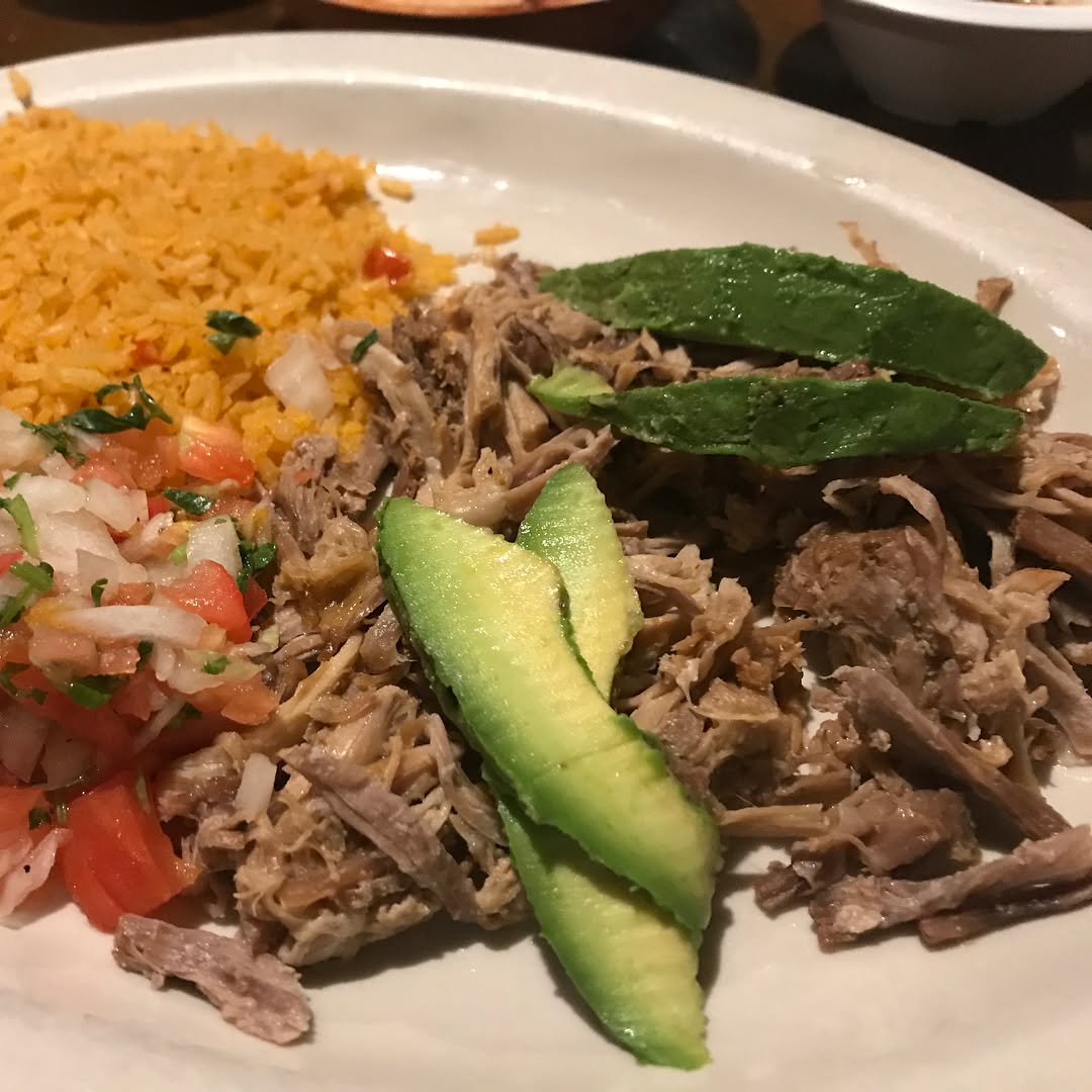 Carnitas and hard shell tacos