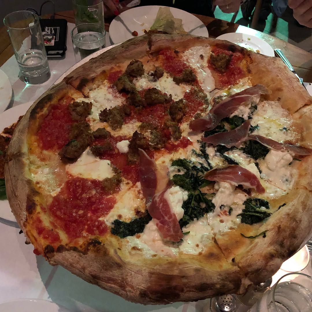 Dinner at  in   We had the sausage pizza, the lasagna, Caesar salad, Mac & ch...