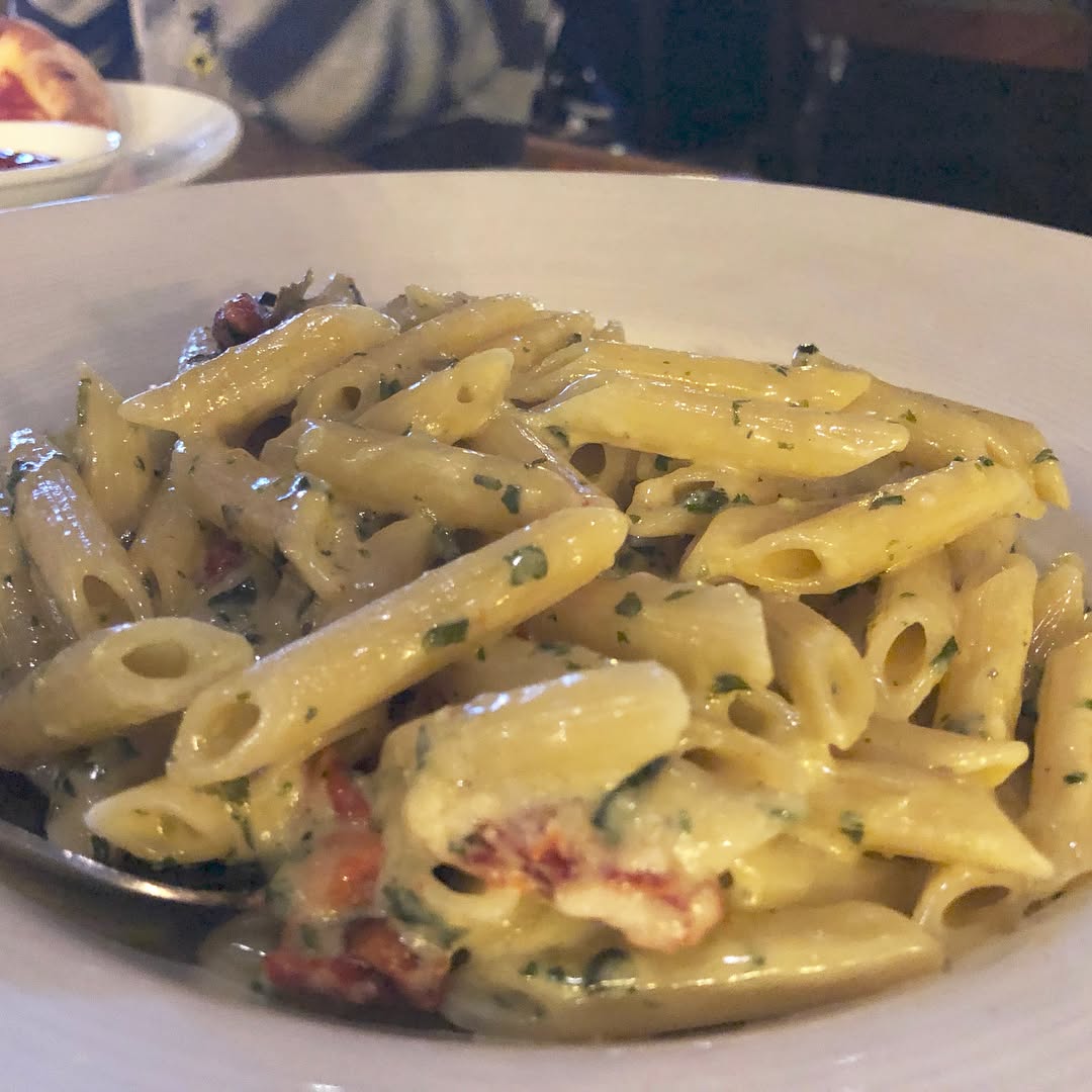 Pizza and pasta at   Thai chicken pizza, an old favorite