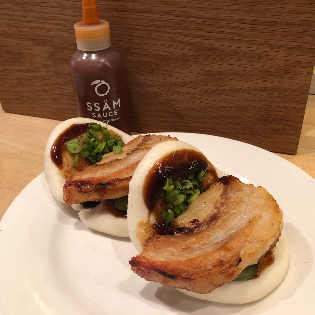 Lunch    we had the momofuku ramen, spicy hozon ramen, and a couple of pork buns