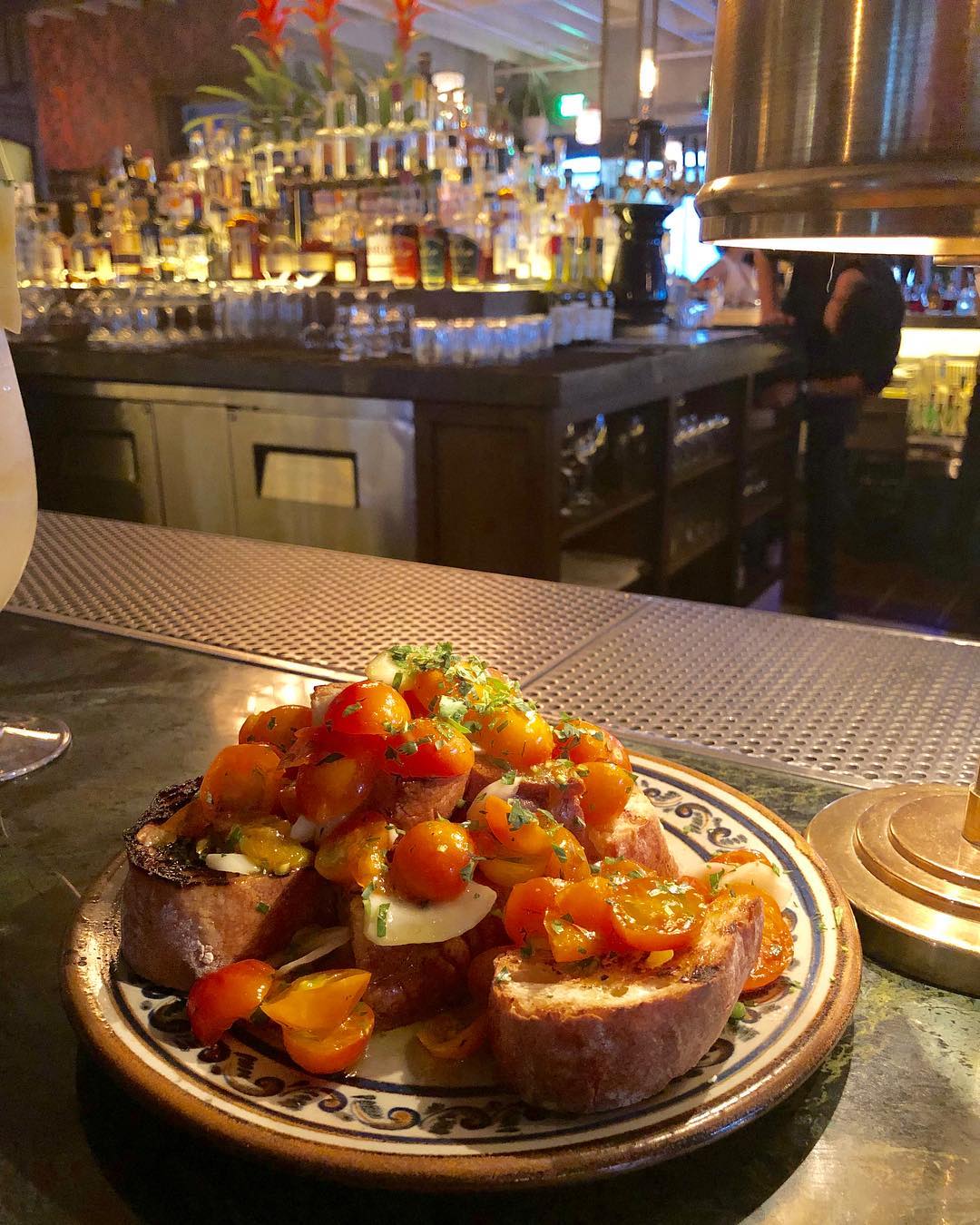 Eating at the bar at Dama in DTLA, fashion district