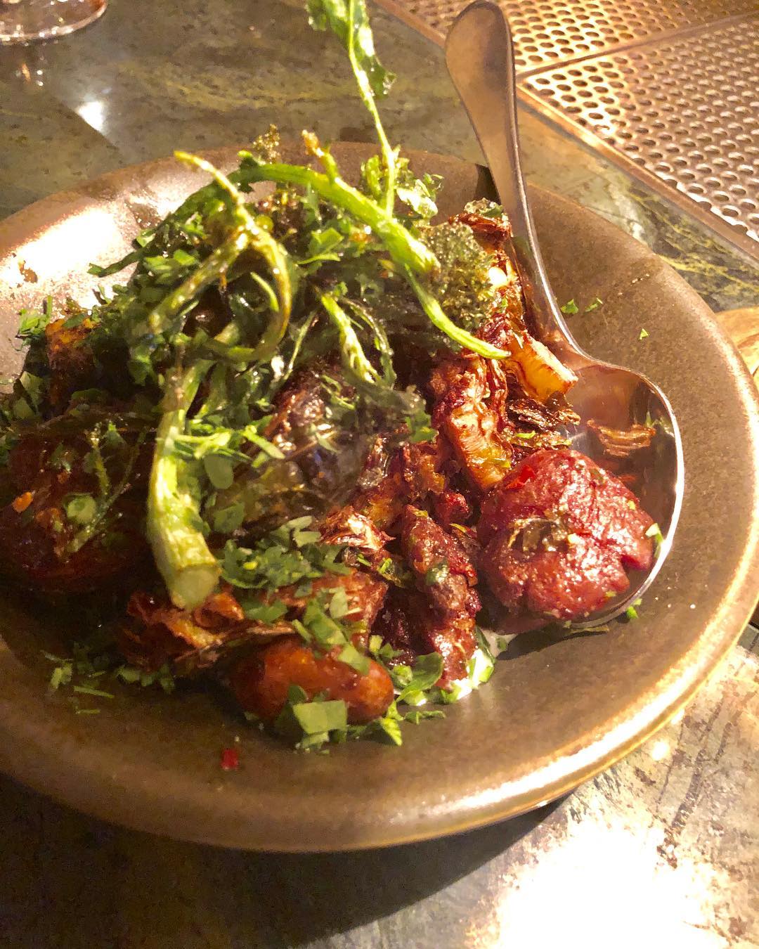 Eating at the bar at Dama in DTLA, fashion district