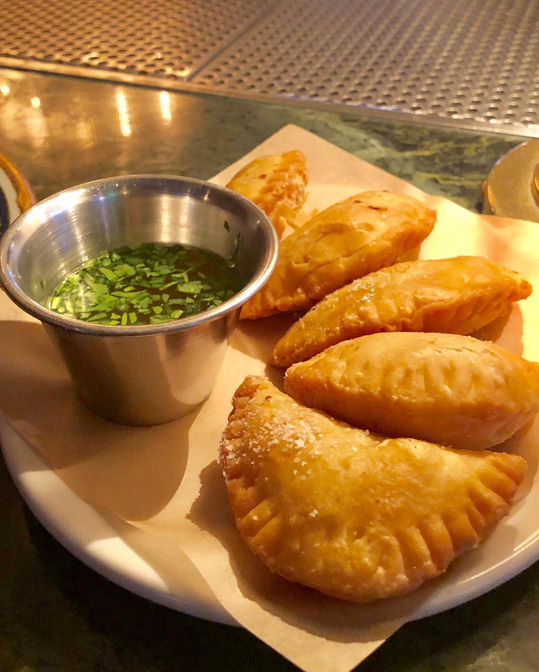 Eating at the bar at Dama in DTLA, fashion district