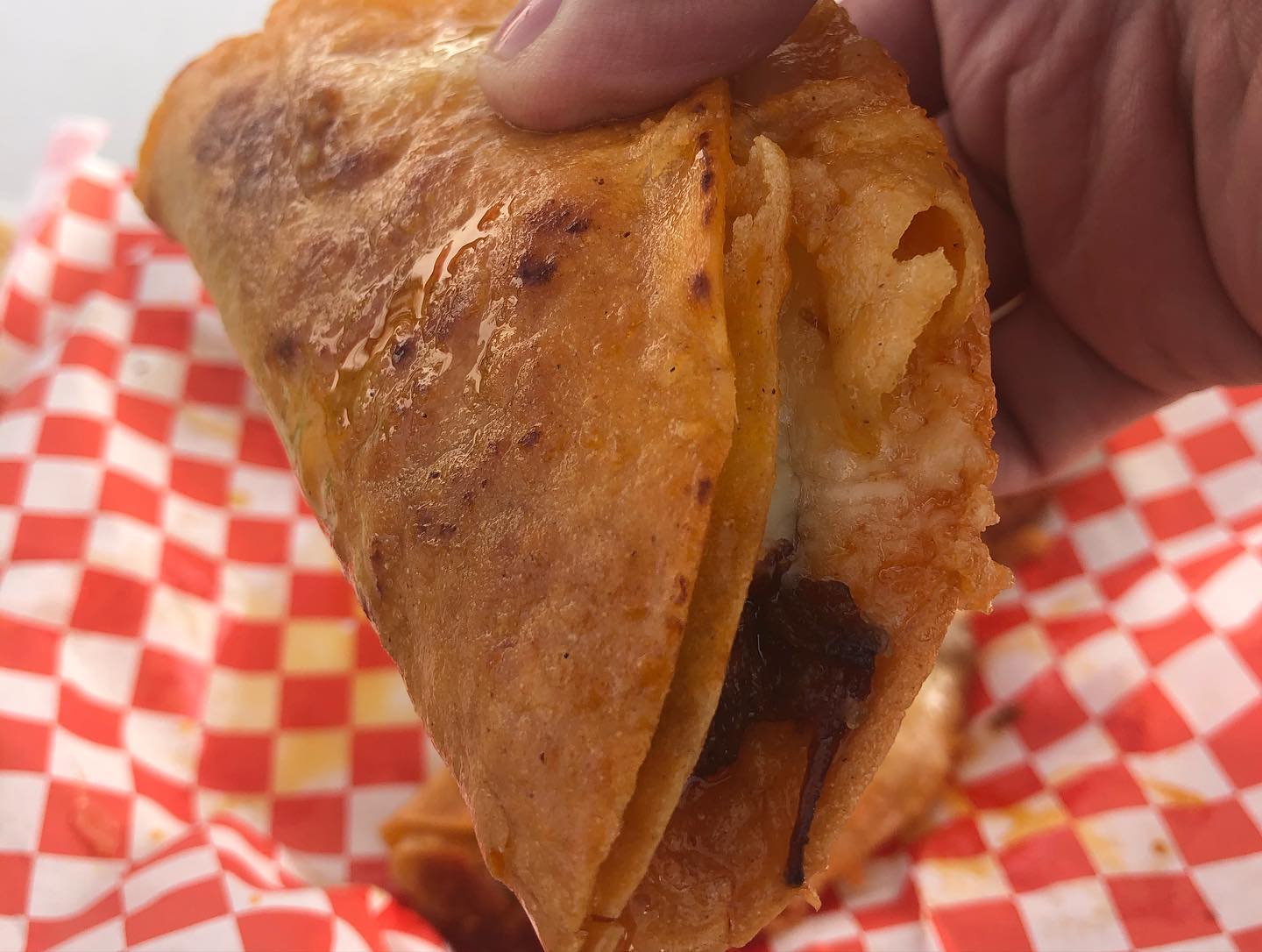 Queso-Tacos, hard shell beef tacos with cheese