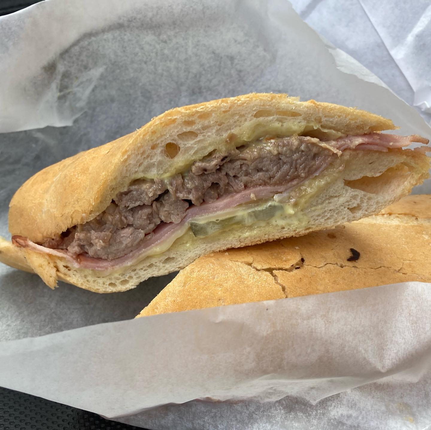 Cubans sandwich with a refugiado and concha