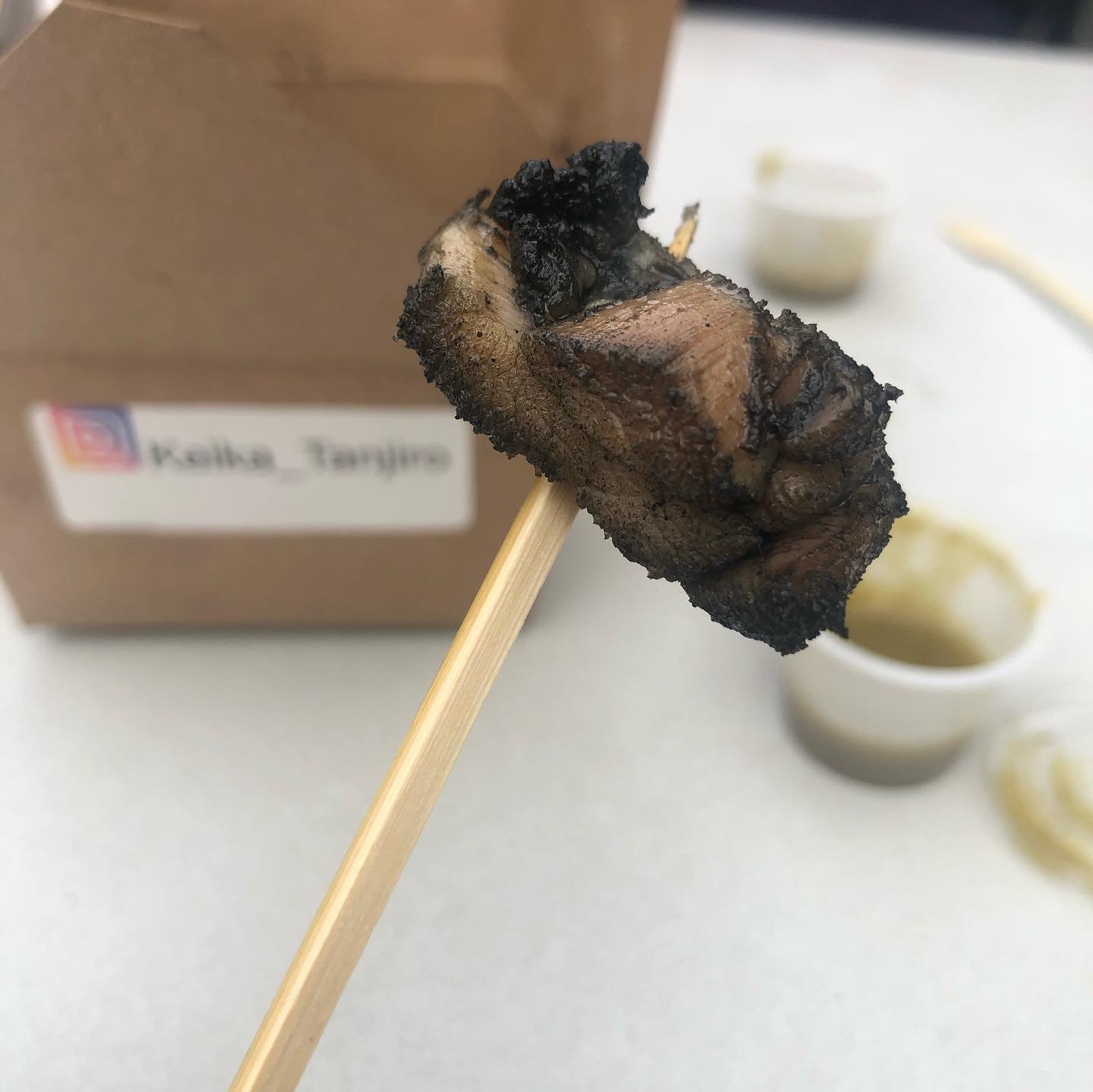 Fired Chicken at Kouraku by   Juicy and tasty chicken fire roasted