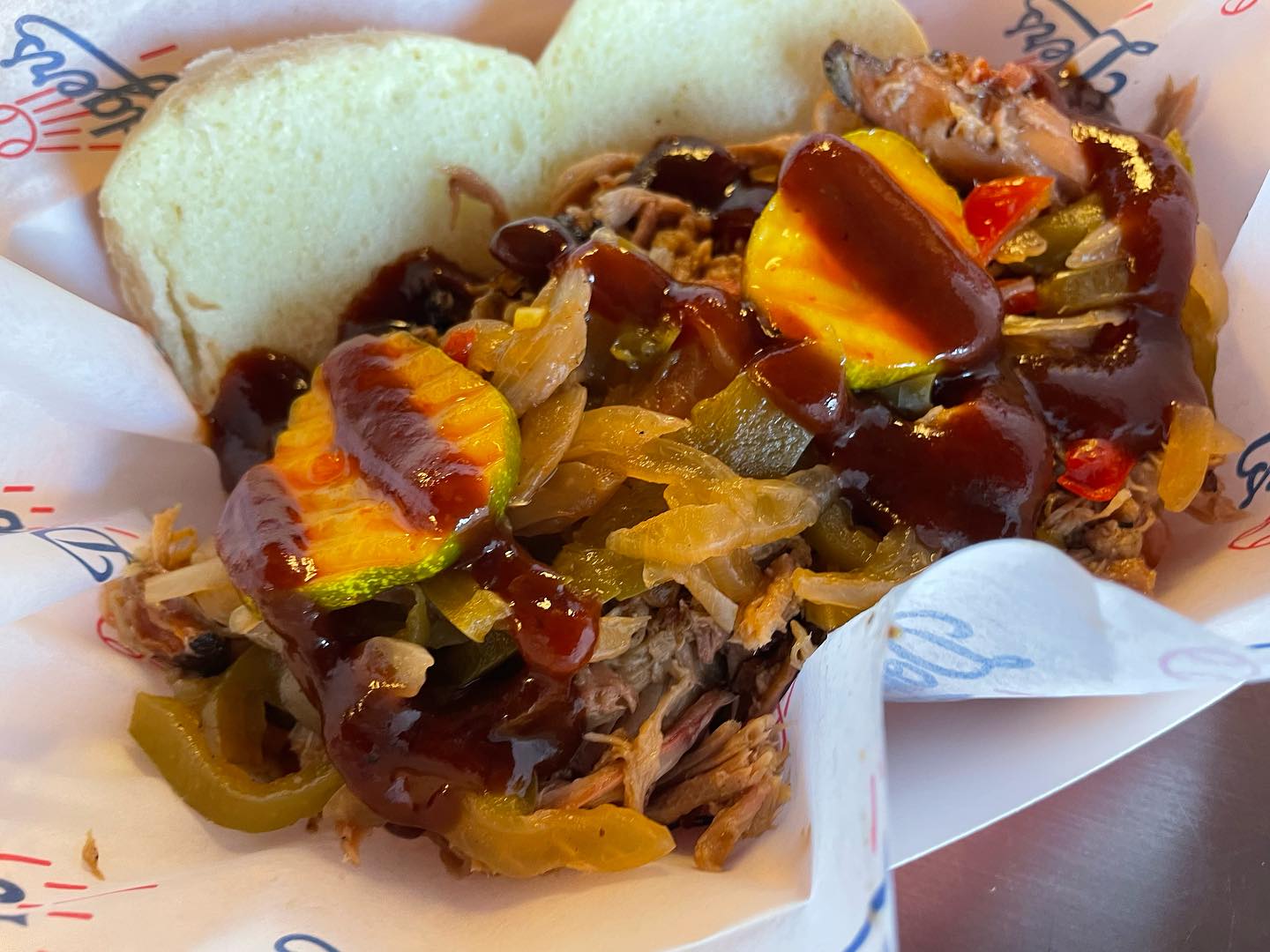 Pulled pork and smoked burnt ends with Kings Hawaiian bread rolls at a Dodger...