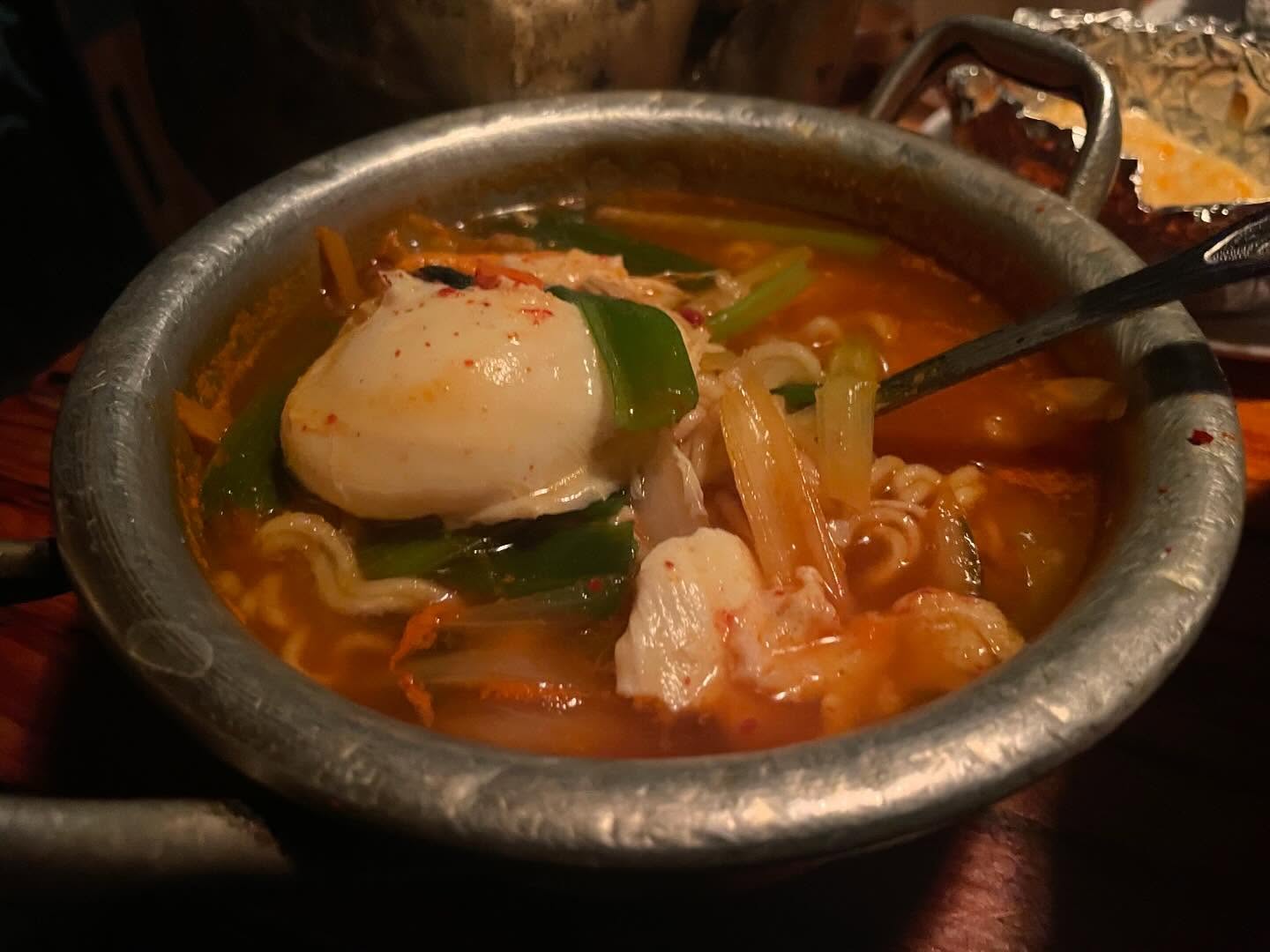 Kimchi pancake, rice box, and skewers at Dan Sung Sa