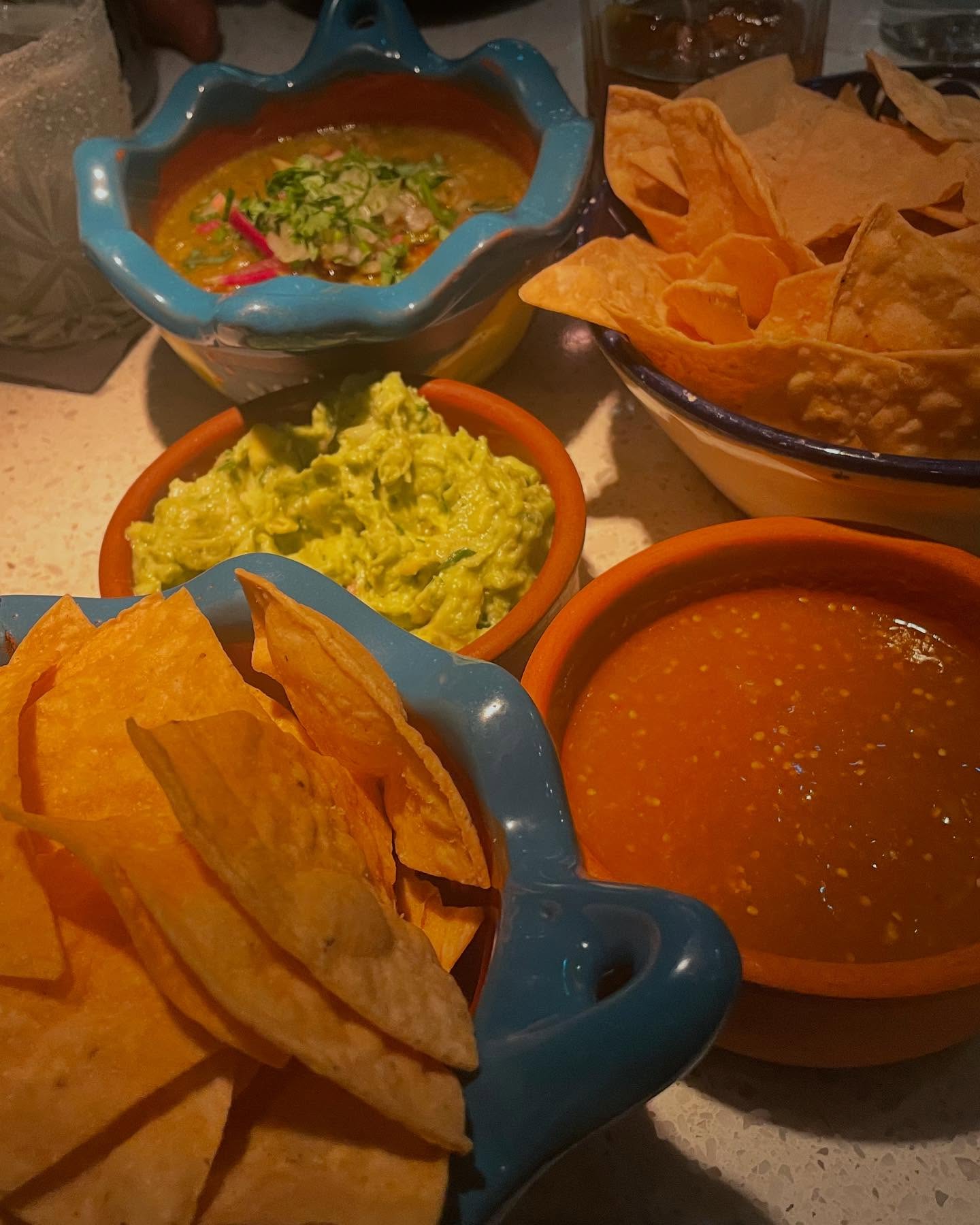 Guerrilla Tacos with carne asada taco and potato and cheese taquito